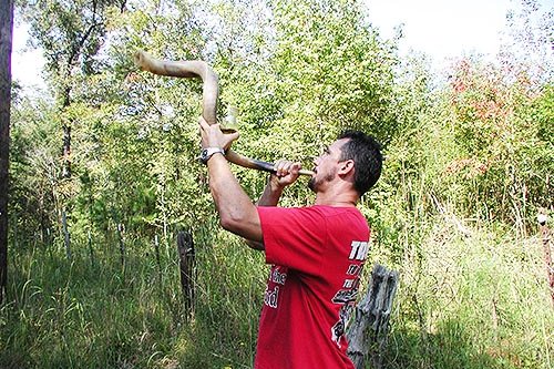 Jeff blowing the shofar